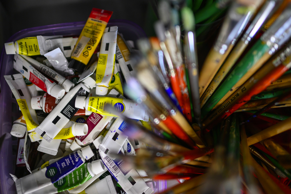 photo of various art supplies on a drafting table