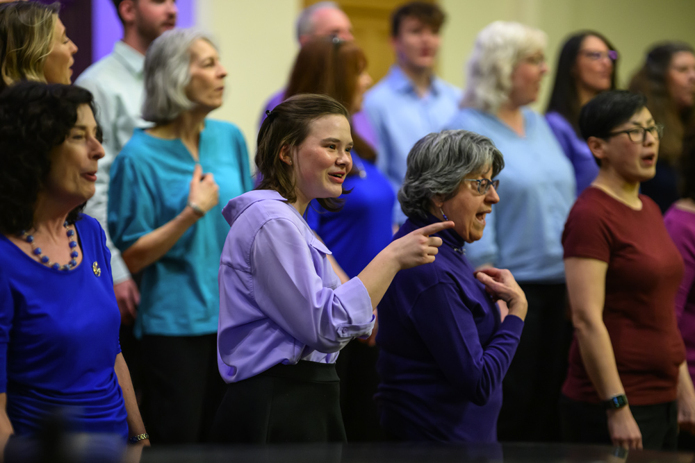 Members of the Springfield College Community Chorus performing during a concert